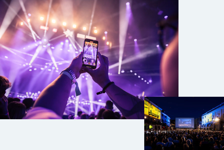 taking pictures with a smartphone at a concert