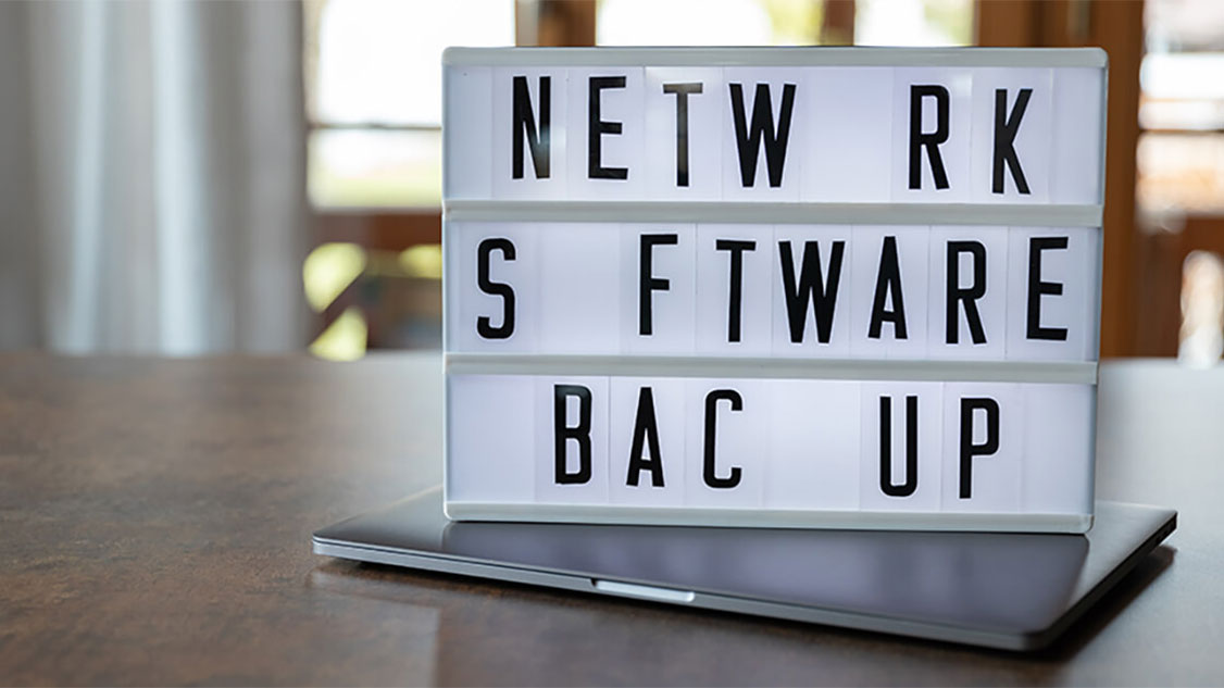The picture shows a lettering that says Network Software Backup with gaps.