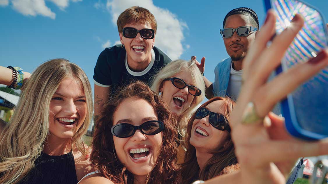 Group of young people celebrating together