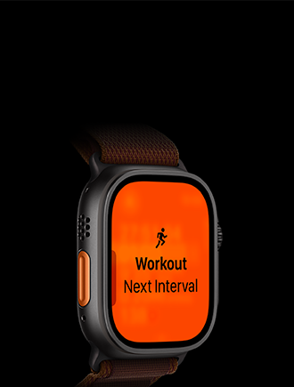 Apple Watch Ultra 4, cassa in titanio nero, allenamento Corsa, intervallo successivo, lato sinistro, tasto Azione arancione, cinturino Alpine Loop