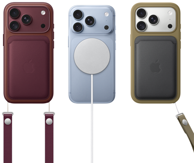 From left to right, iPhone 18 Pro in Burgundy leather case with Burgundy Crossbody strap, middle iPhone 18 Pro in Glacier with White MagSafe charger attached, right iPhone 18 Pro in Silver in green leather wallet case with wrist strap