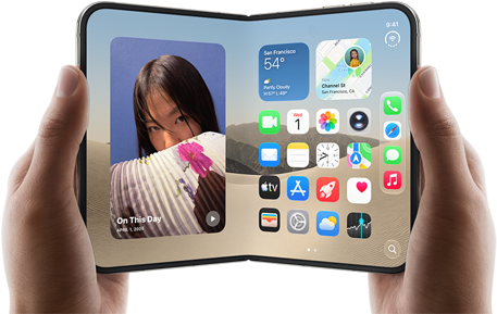iPhone Duo, Star White color, held by two hands in landscape orientation, unfolded, interior screen displays photos on the left, apps on the right